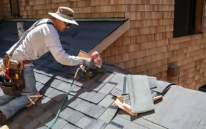 Professional roofer performing residential roof repair services