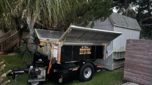 LePierre Roofing debris trailer at a Nassau County roof replacement