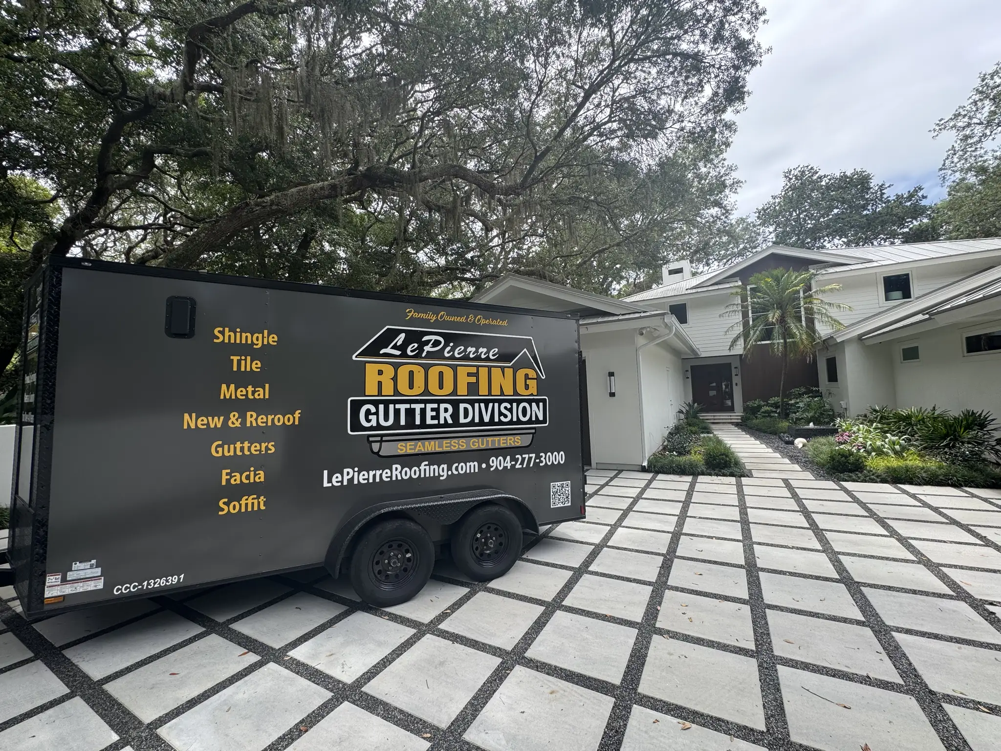 LePierre Roofing Gutter Division trailer at a Nassau County home for seamless gutter installation