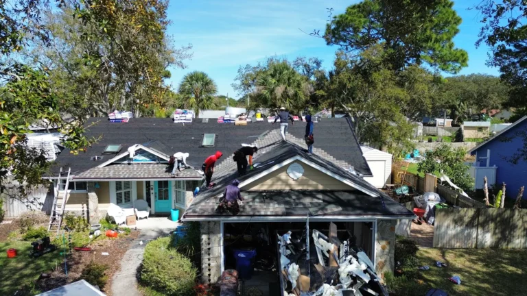 LePierre Roofing crew working on a roof in Nassau County
